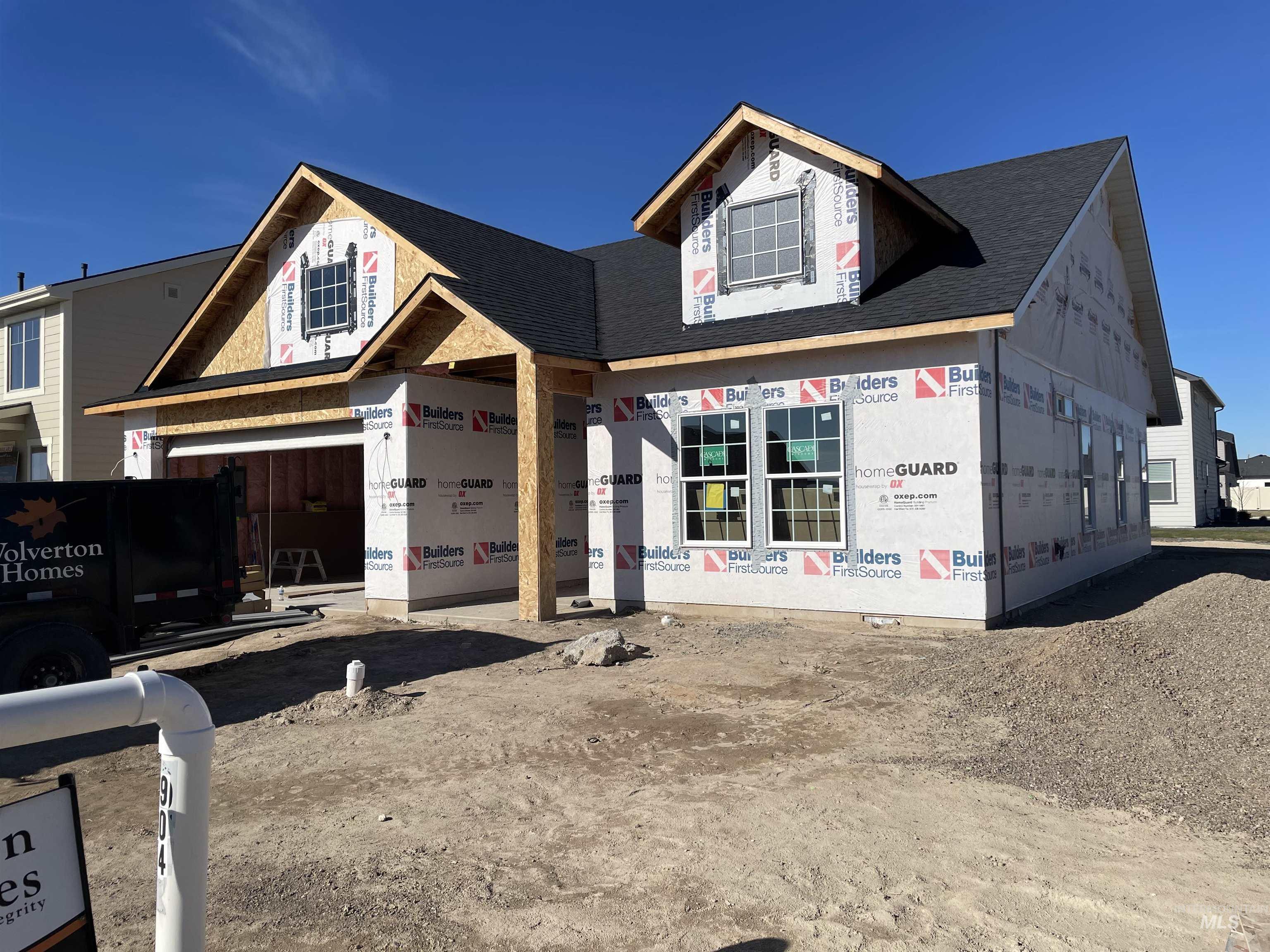 Property under construction with a shingled roof