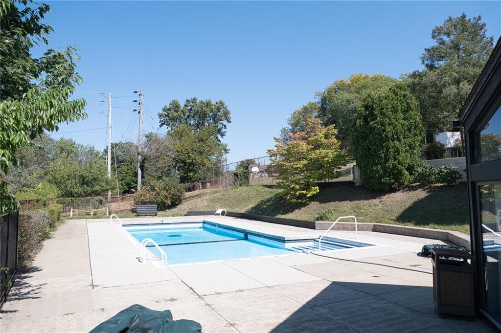 2034 Swallow Hill Road, Unit 326 Pittsburgh, PA 15220 - Photo 22 of 28 a view of a street with houses