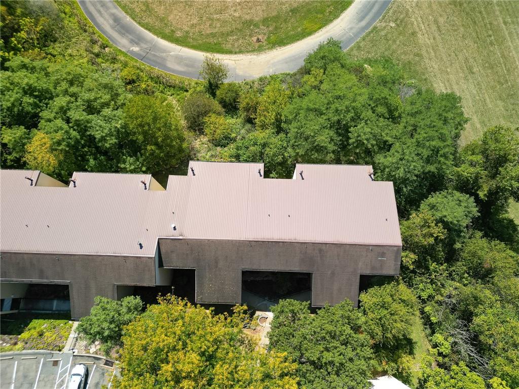 2034 Swallow Hill Road, Unit 326 Pittsburgh, PA 15220 - Photo 28 of 28 an aerial view of a house with yard and outdoor seating
