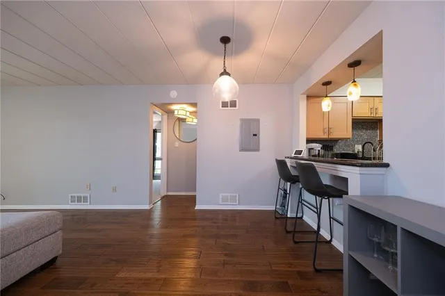 a view of dining room with wooden floor