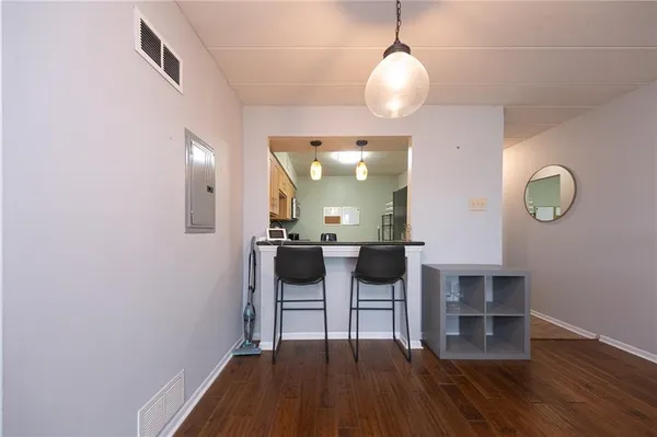 a view of dining room with wooden floor