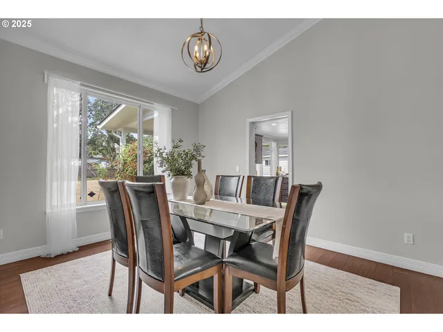 a view of a bathroom with a glass shower door