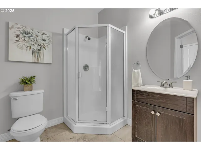 a kitchen with kitchen island a sink stainless steel appliances and cabinets