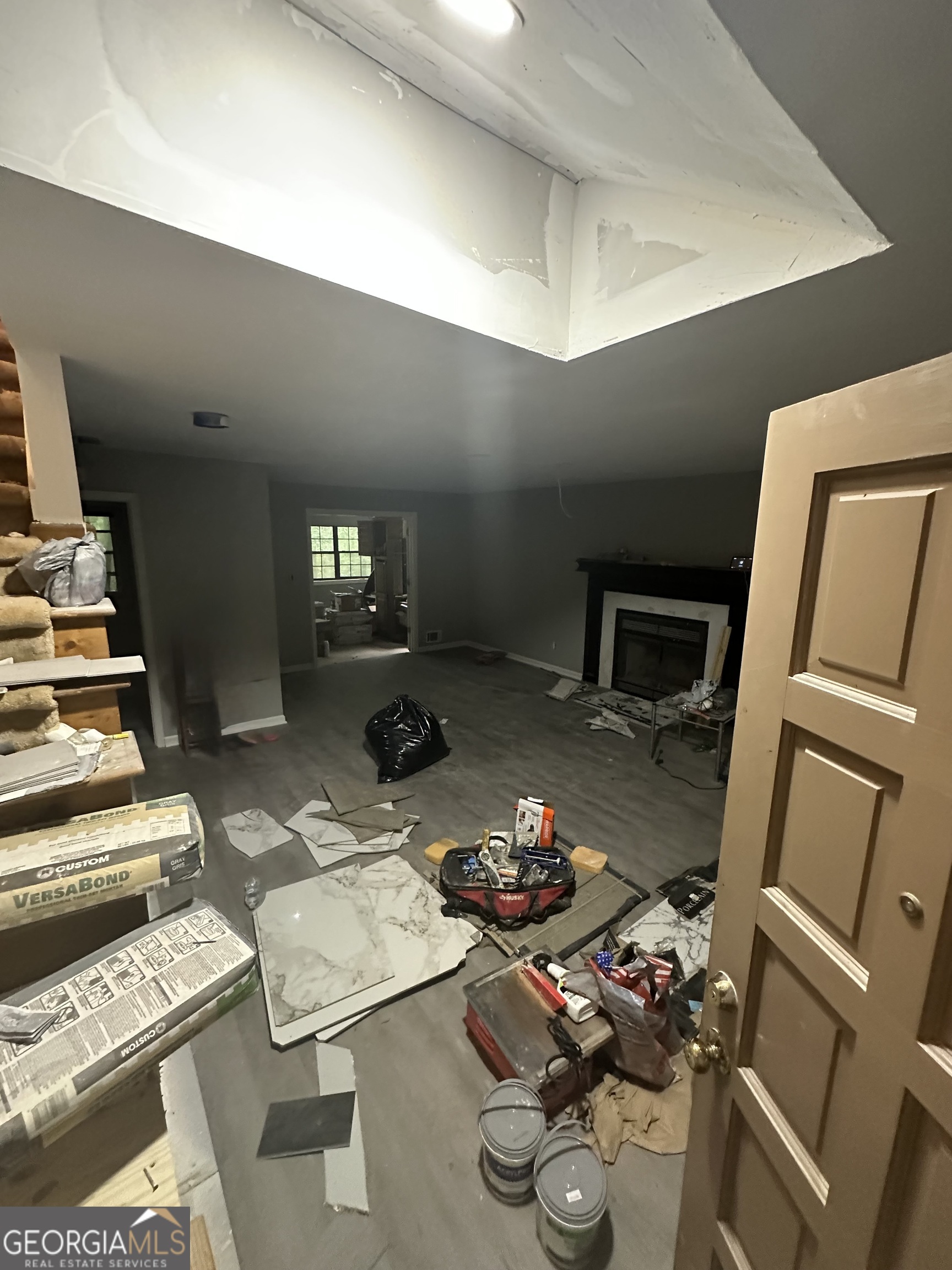 307 Winding Stream Trail Southwest Conyers, GA 30094 - Photo 33 of 33 a living room with hard wood furniture and a wooden floor