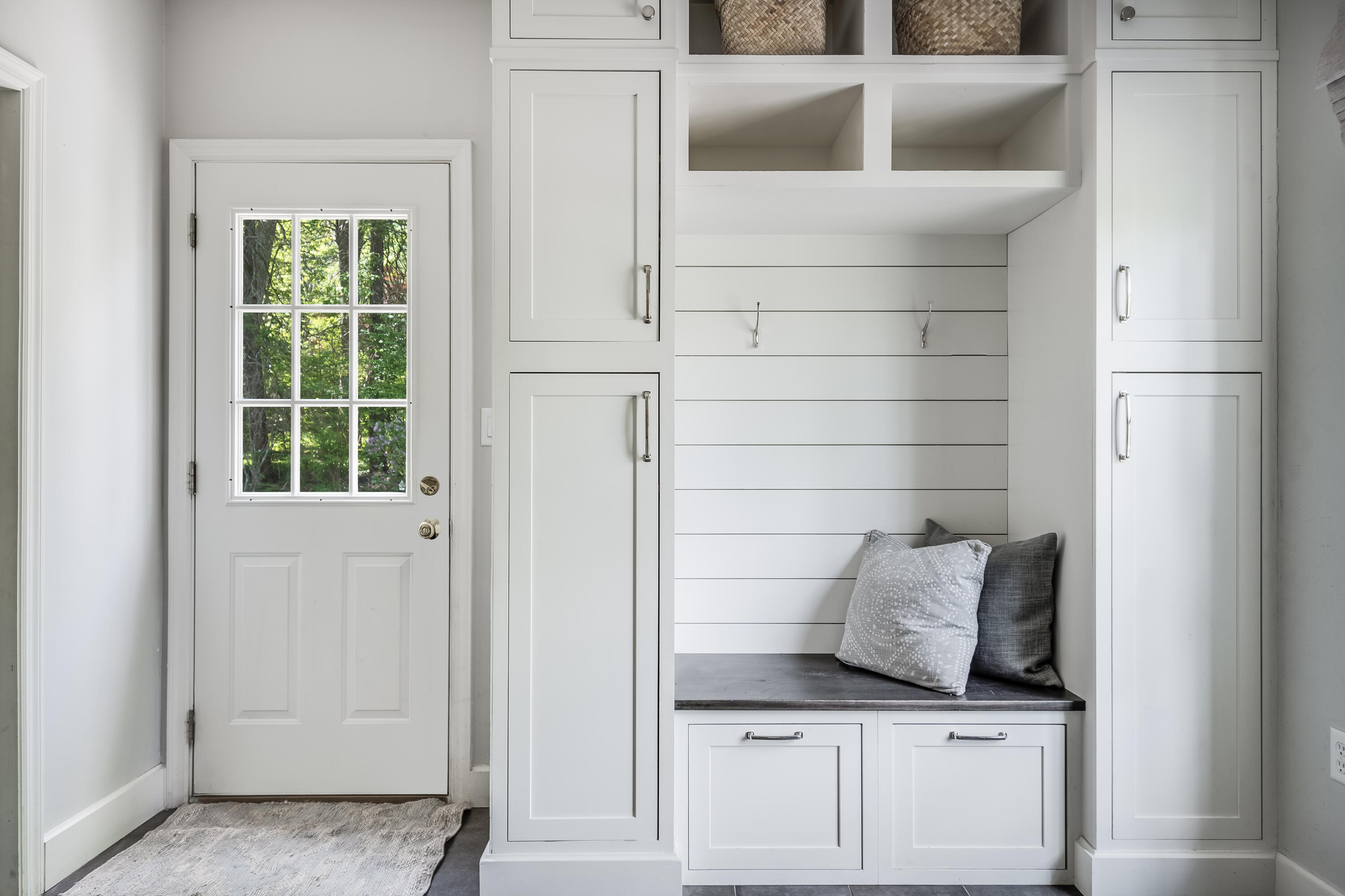155 Hillcrest Road New Canaan, CT 06840 - Photo 15 of 32 a kitchen with a white cabinets and a stove