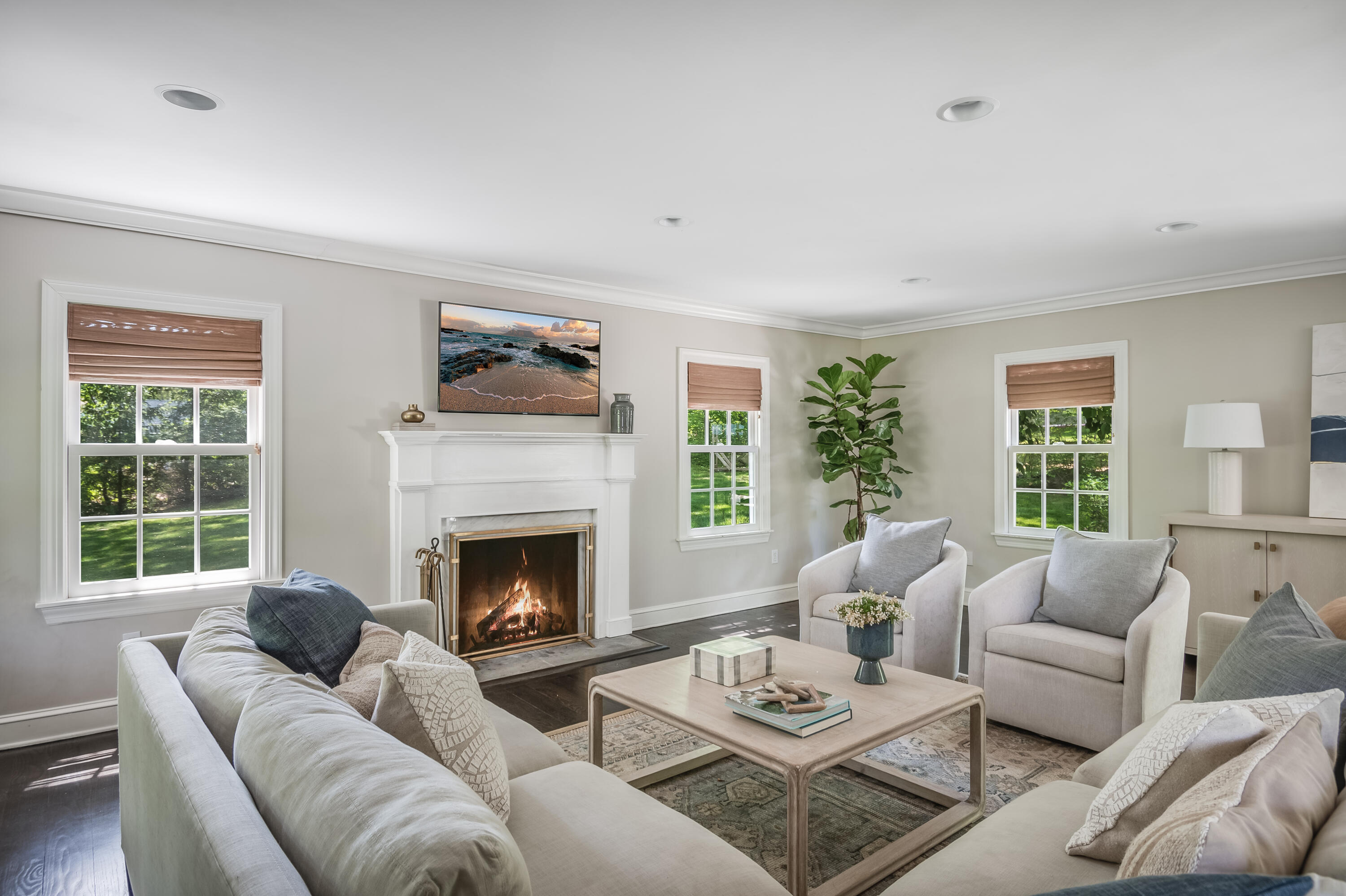 155 Hillcrest Road New Canaan, CT 06840 - Photo 19 of 32 a living room with furniture and a fireplace