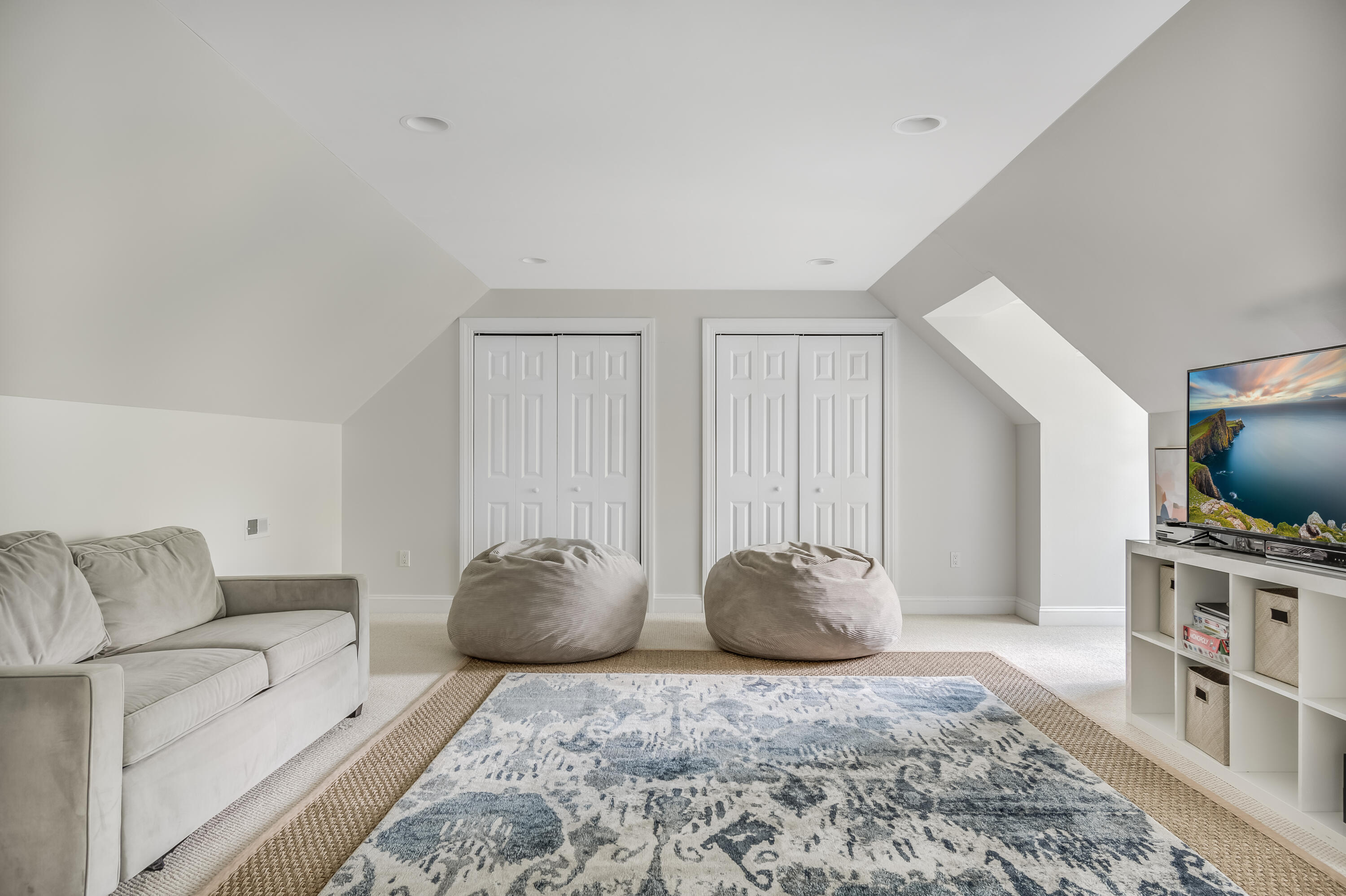 155 Hillcrest Road New Canaan, CT 06840 - Photo 28 of 32 a bedroom with furniture and a flat screen tv