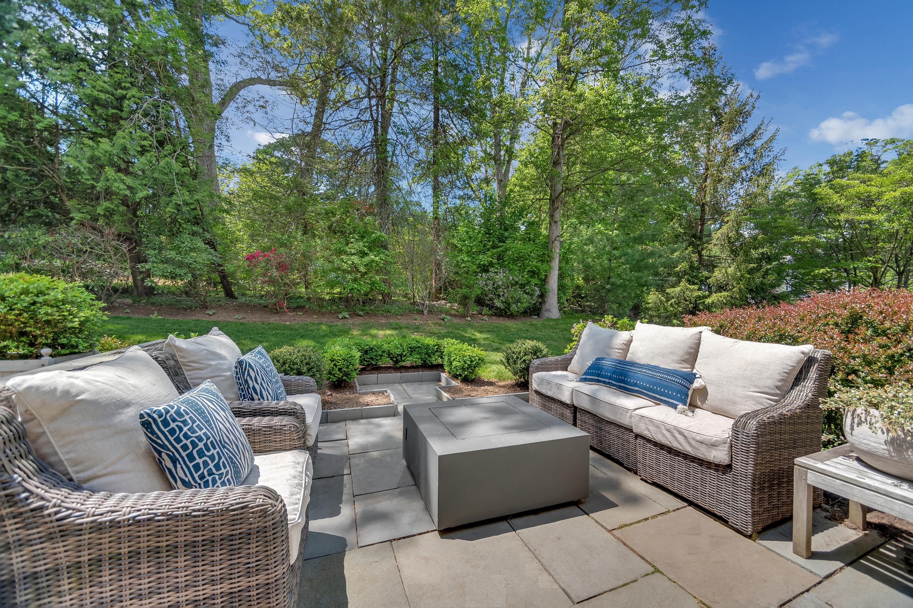 155 Hillcrest Road New Canaan, CT 06840 - Photo 31 of 32 a view of a patio with couches and a table
