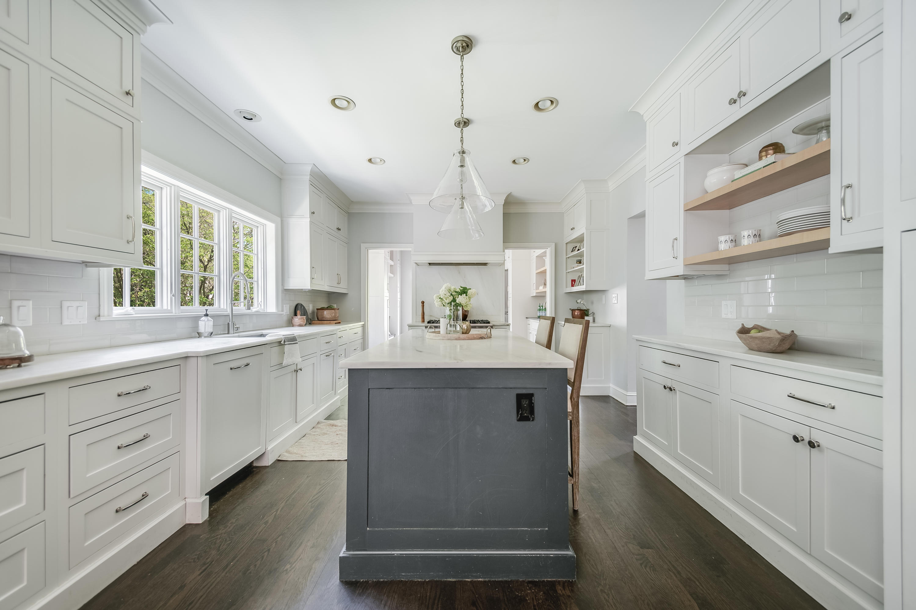 155 Hillcrest Road New Canaan, CT 06840 - Photo 10 of 32 a view of cabinets a sink and dishwasher with wooden floor