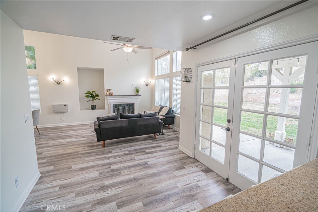 25535 Chisom Lane Stevenson Ranch, CA 91381 - Photo 17 of 37 a large room with a large window and furniture