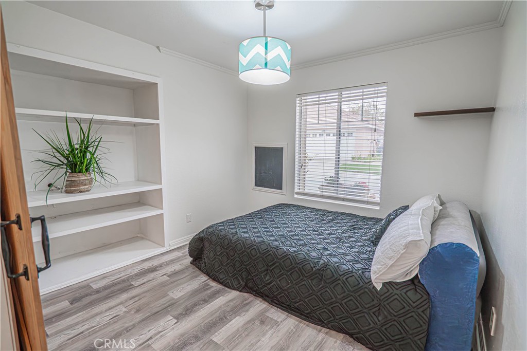 25535 Chisom Lane Stevenson Ranch, CA 91381 - Photo 20 of 37 a bedroom with a bed and a window