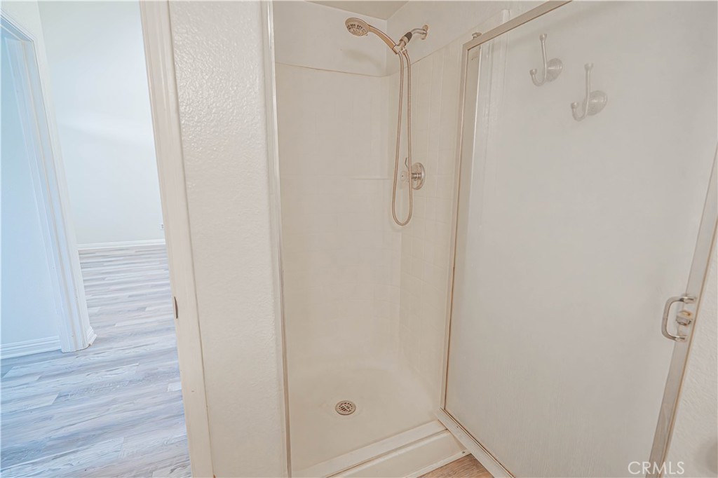 25535 Chisom Lane Stevenson Ranch, CA 91381 - Photo 22 of 37 a bathroom with a shower