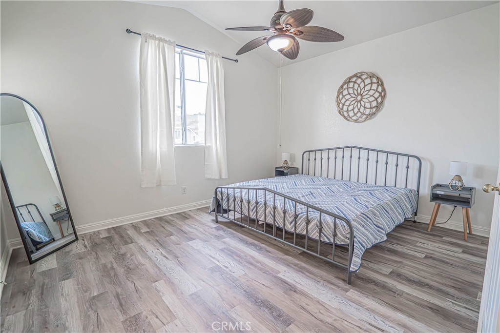 25535 Chisom Lane Stevenson Ranch, CA 91381 - Photo 23 of 37 a bedroom with a bed and a window