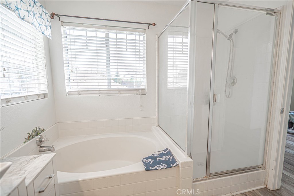25535 Chisom Lane Stevenson Ranch, CA 91381 - Photo 28 of 37 a white bath tub sitting next to a window
