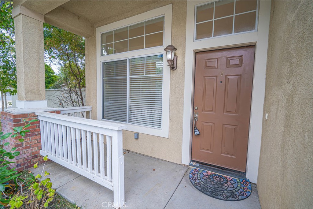 25535 Chisom Lane Stevenson Ranch, CA 91381 - Photo 6 of 37 a view of porch with a black gate