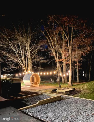 a view of a lake with a yard