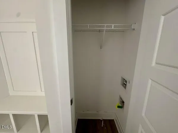a view of a room with racks on the wall