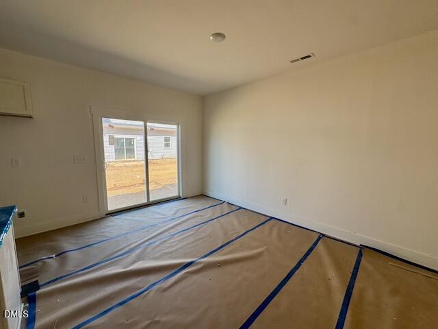 218 George Street, Unit A Four Oaks, NC 27524 - Photo 16 of 42 a view of an empty room and window