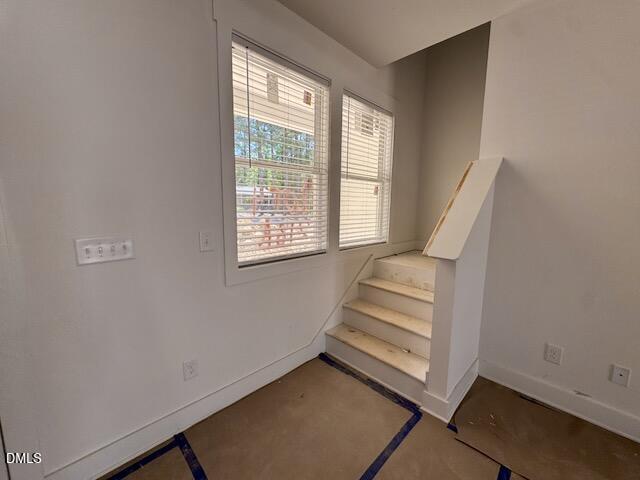218 George Street, Unit A Four Oaks, NC 27524 - Photo 18 of 42 an empty room with a window