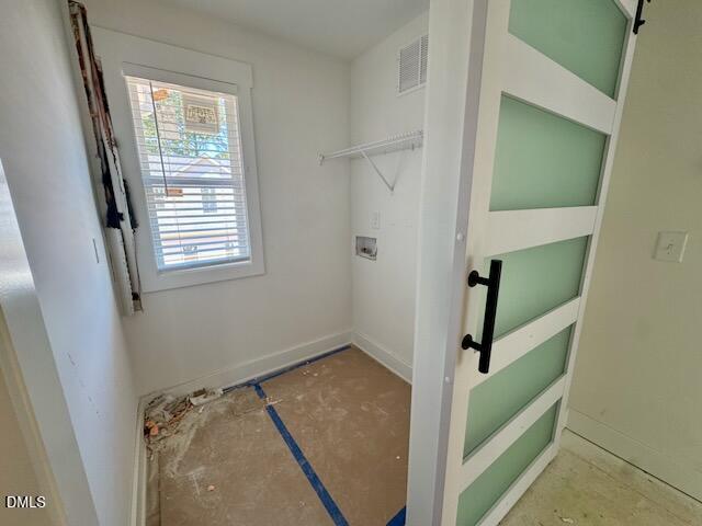 218 George Street, Unit A Four Oaks, NC 27524 - Photo 21 of 42 a view of storage and utility room with a window