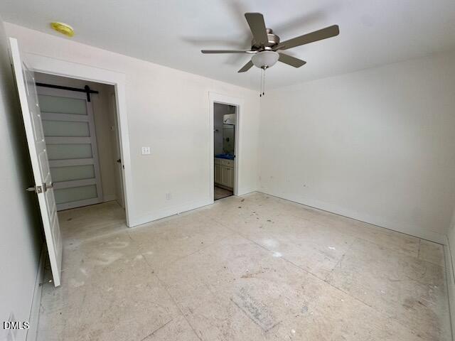 218 George Street, Unit A Four Oaks, NC 27524 - Photo 26 of 42 an empty room with closet and a ceiling fan