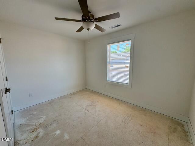 218 George Street, Unit A Four Oaks, NC 27524 - Photo 34 of 42 en empty room with windows