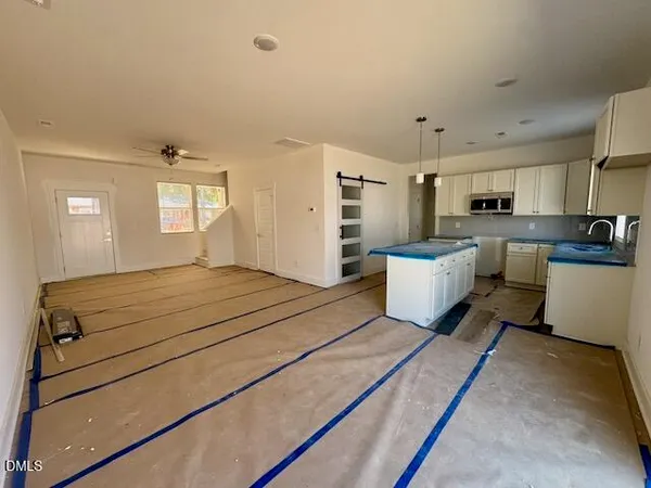 a view of balcony with wooden floor