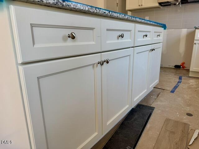 218 George Street, Unit A Four Oaks, NC 27524 - Photo 7 of 42 a white refrigerator freezer sitting inside of a kitchen