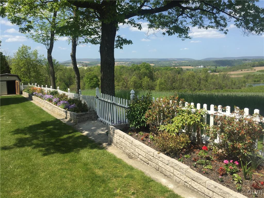 1731 Clearview Road Coplay, PA 18037 - Photo 7 of 31 Beautiful Flowers and Trees and Fencing