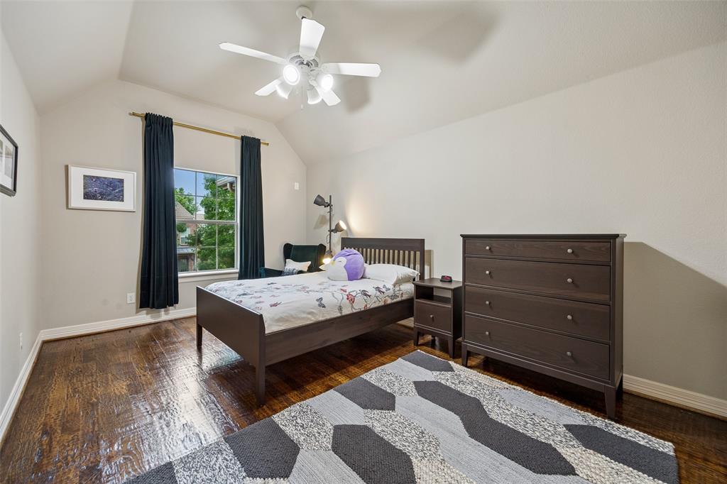 1608 Tuscan Ridge Circle Southlake, TX 76092 - Photo 22 of 36 a bedroom with a bed window and a dresser