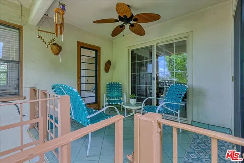 a view of entryway with a chandelier