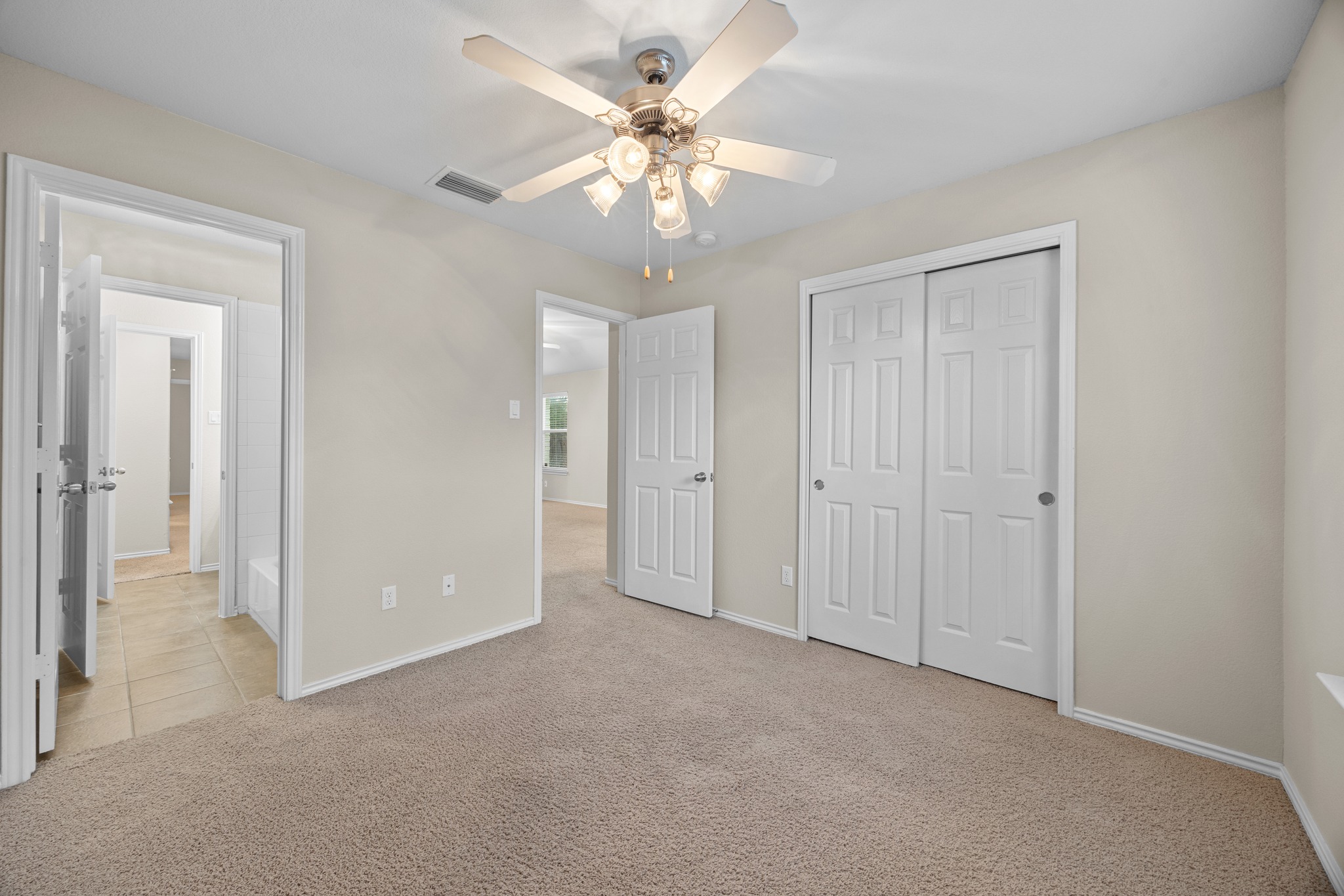 418 Nottingham Loop Kyle, TX 78640 - Photo 23 of 28 Carpeted room with neutral wall paint and white trim