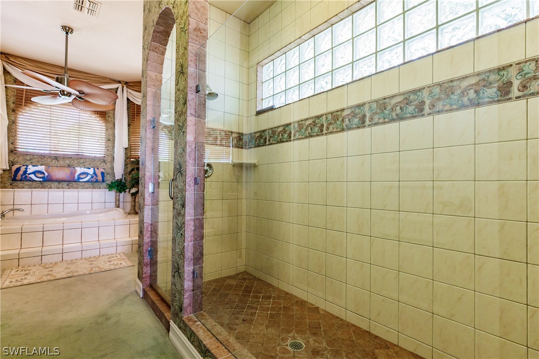 5727 Riverside Drive Cape Coral, FL 33904 - Photo 12 of 35 a bathroom with a shower