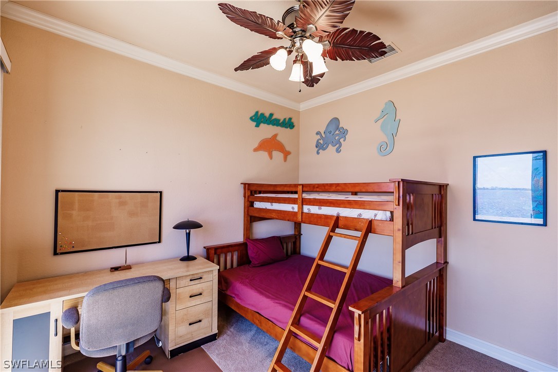 5727 Riverside Drive Cape Coral, FL 33904 - Photo 15 of 35 a room with table and a chair