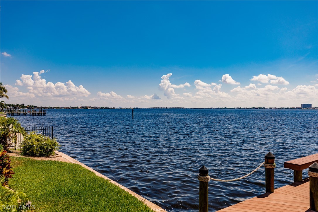 5727 Riverside Drive Cape Coral, FL 33904 - Photo 19 of 35 a view of a balcony with an outdoor space