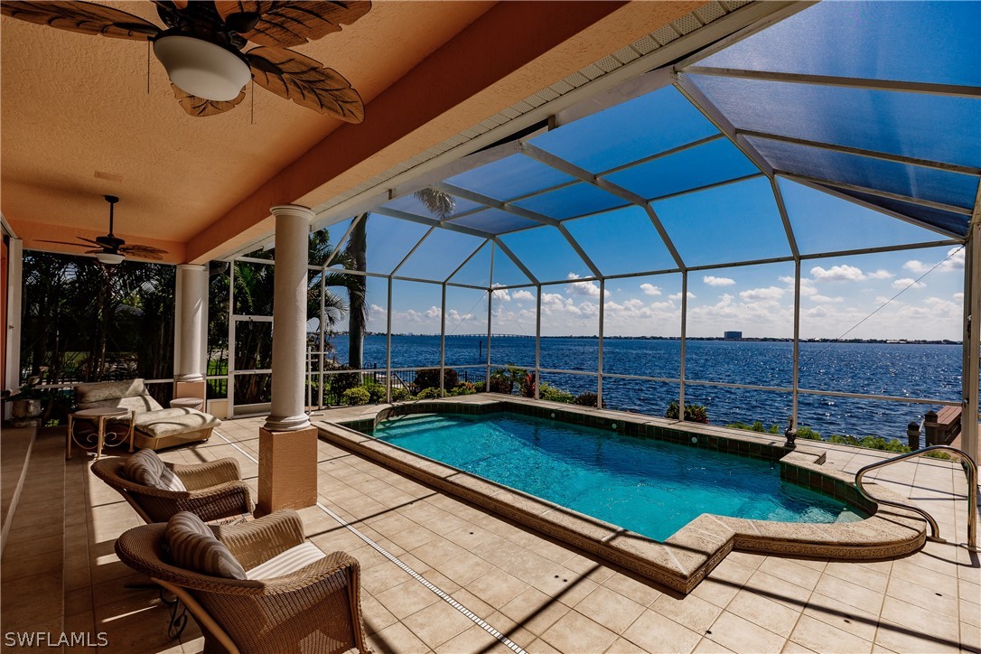 5727 Riverside Drive Cape Coral, FL 33904 - Photo 21 of 35 a outdoor space with patio lots of furniture