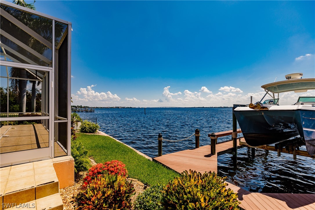 5727 Riverside Drive Cape Coral, FL 33904 - Photo 27 of 35 a view of a balcony with chairs