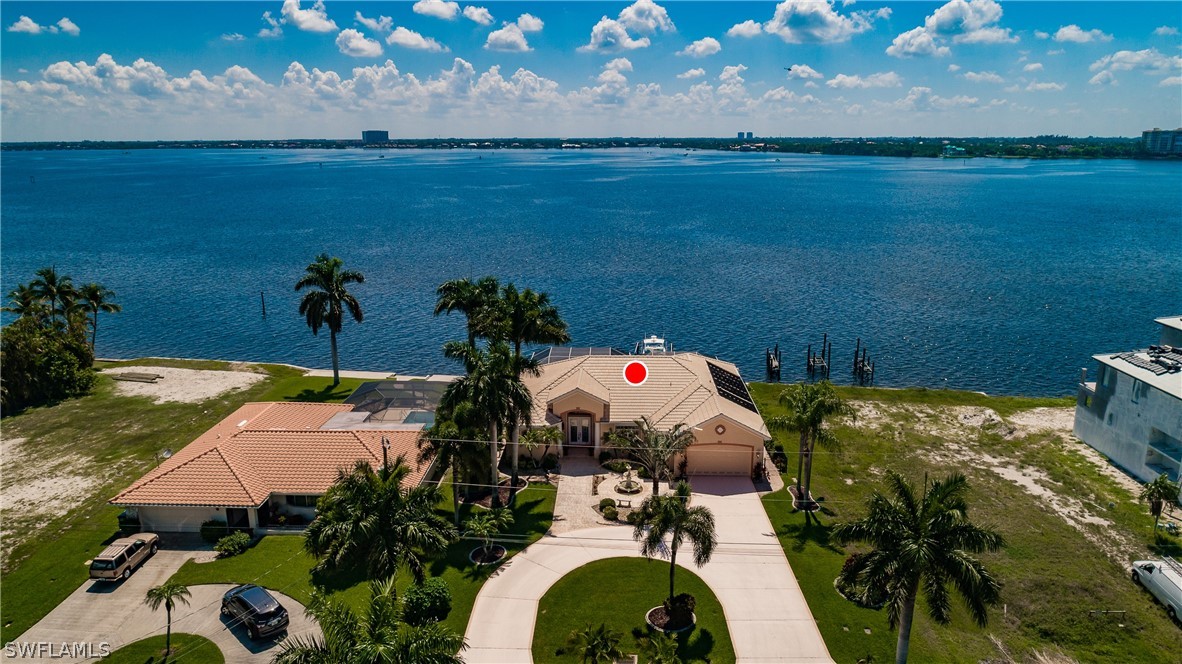 5727 Riverside Drive Cape Coral, FL 33904 - Photo 29 of 35 a view of an outdoor space and a lake view