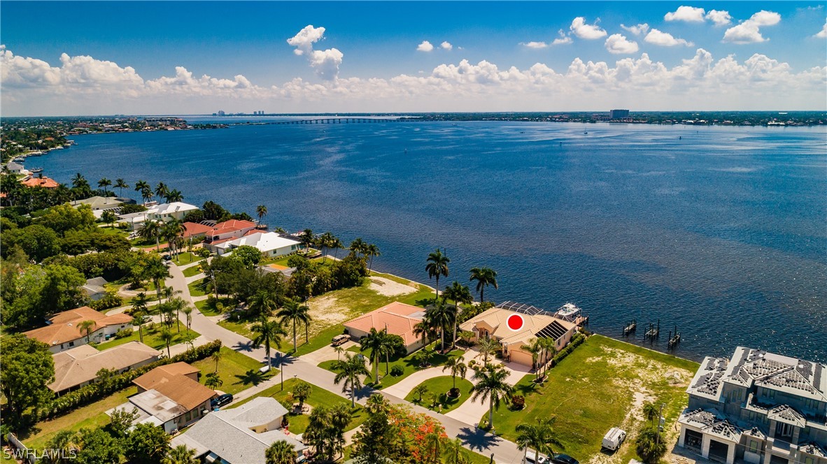 5727 Riverside Drive Cape Coral, FL 33904 - Photo 32 of 35 an aerial view of a house