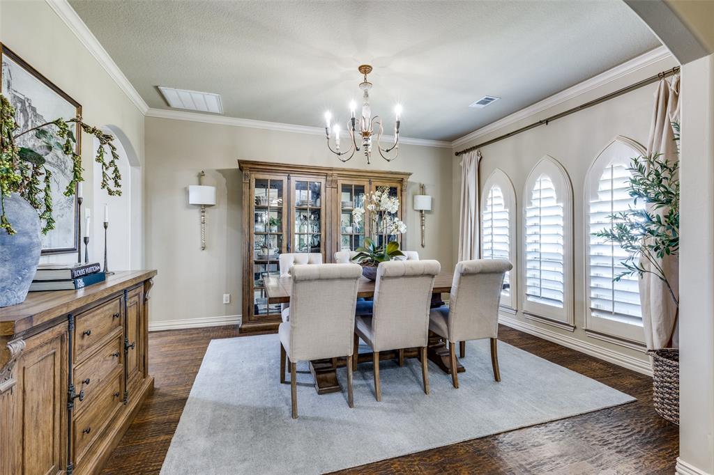 1150 Lone Star Road Bowie, TX 76230 - Photo 15 of 38 a view of a dining room with furniture window and wooden floor