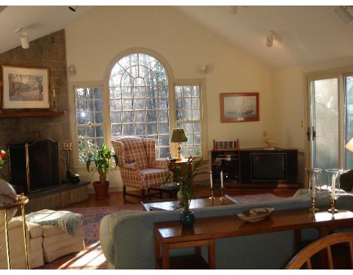 88 Hampshire Road Wellesley, MA 02481 - Photo 13 of 28 a living room with furniture and a large window