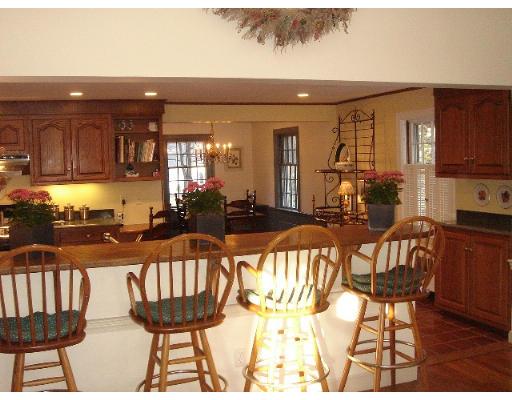 88 Hampshire Road Wellesley, MA 02481 - Photo 15 of 28 a view of a dining room with furniture and wooden floor