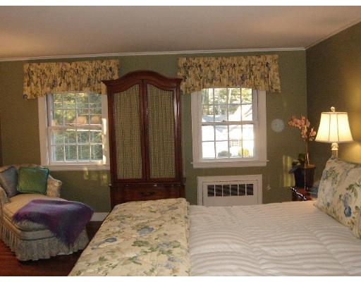 88 Hampshire Road Wellesley, MA 02481 - Photo 21 of 28 a bedroom with a bed and a window