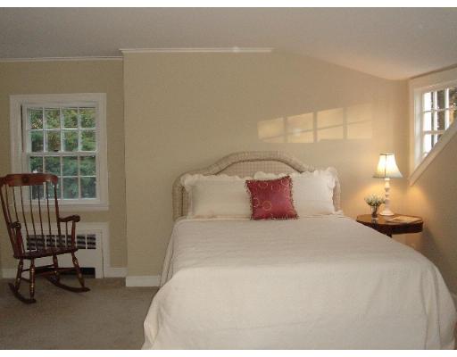 88 Hampshire Road Wellesley, MA 02481 - Photo 22 of 28 a bedroom with a bed and a window
