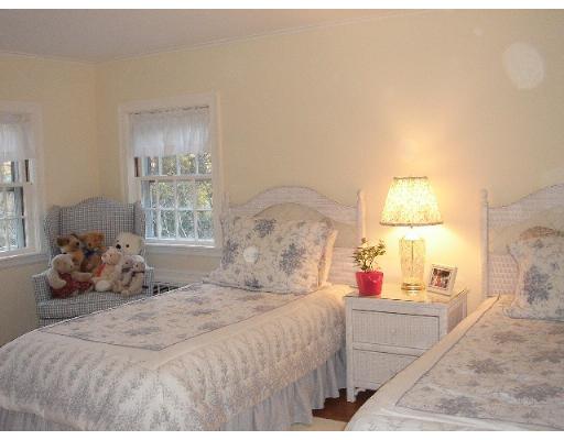 88 Hampshire Road Wellesley, MA 02481 - Photo 24 of 28 a bedroom with a bed and a window
