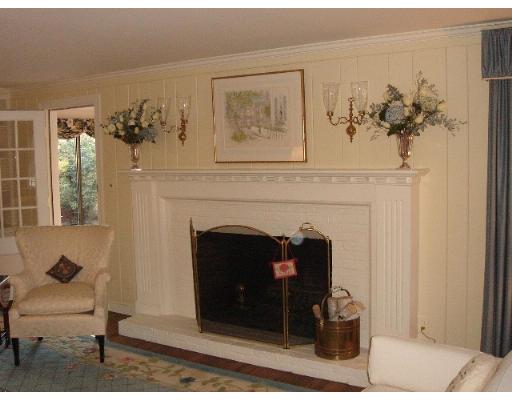 88 Hampshire Road Wellesley, MA 02481 - Photo 6 of 28 a living room with furniture and a fireplace