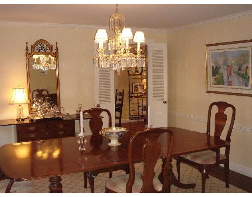 88 Hampshire Road Wellesley, MA 02481 - Photo 7 of 28 a view of a dining room with furniture and chandelier