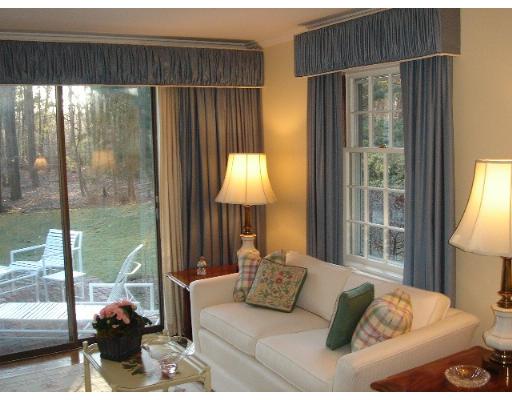 88 Hampshire Road Wellesley, MA 02481 - Photo 8 of 28 a living room with furniture and a floor to ceiling window