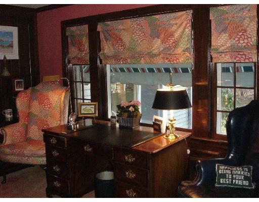 88 Hampshire Road Wellesley, MA 02481 - Photo 10 of 28 a living room with a large window and a table
