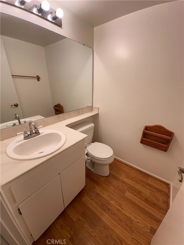 957 South Landmark Lane Anaheim, CA 92805 - Photo 15 of 24 a bathroom with a sink and a toilet